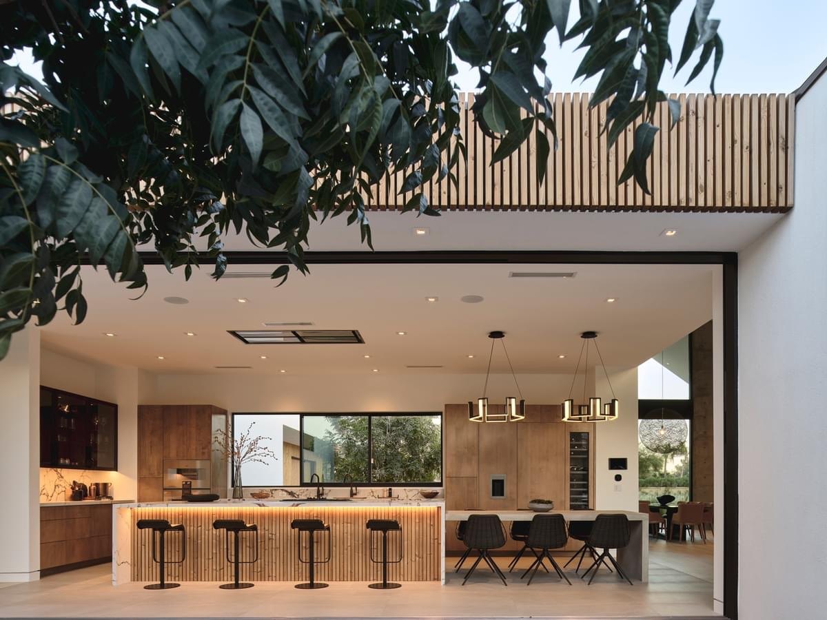 Original listing photo: kitchen opening onto the courtyard