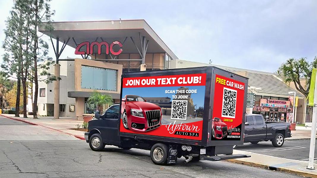 aadm led truck outside movie theater